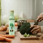 A woman preparing food using VCO