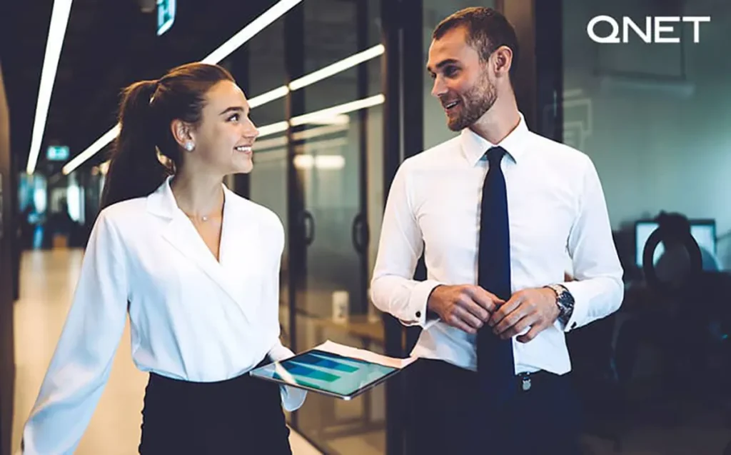 Two direct sellers having a friendly conversation with each other