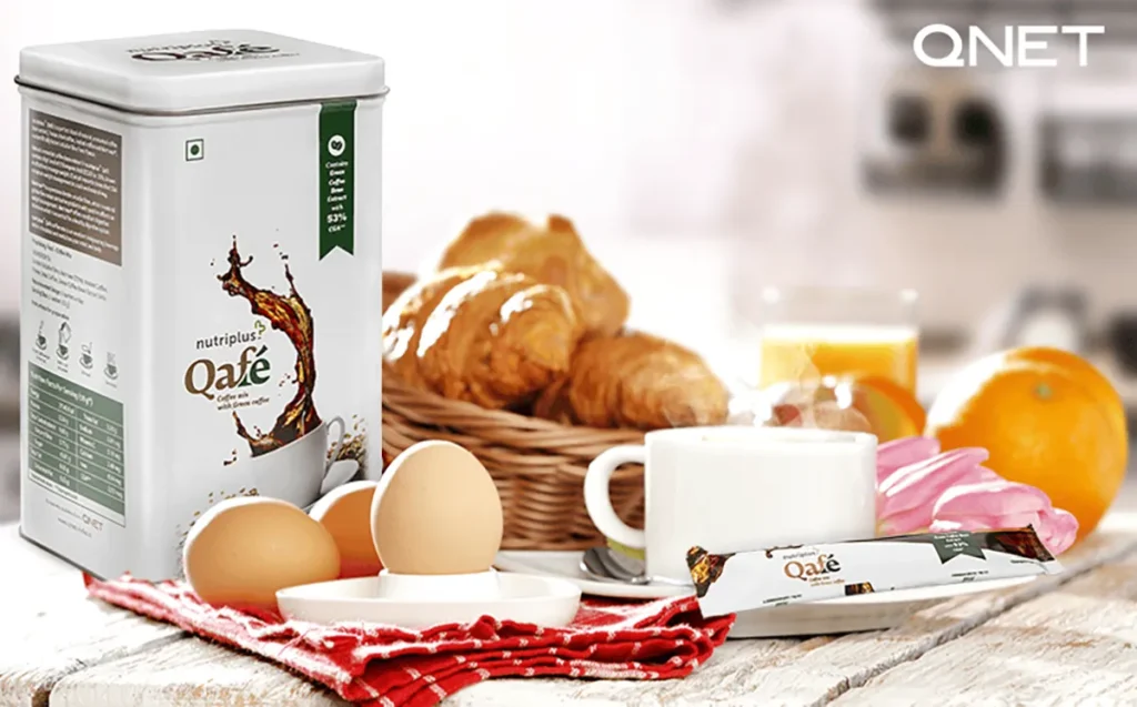 A wooden breakfast table featuring Nutriplus Qafe