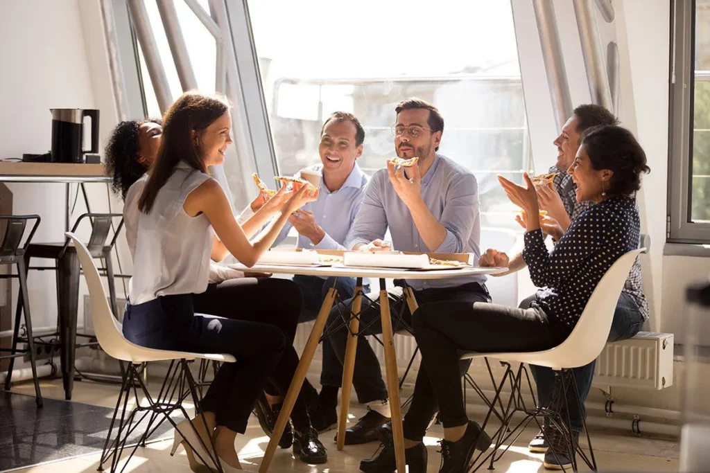 complete wellbeing: group of friends talking and laughing