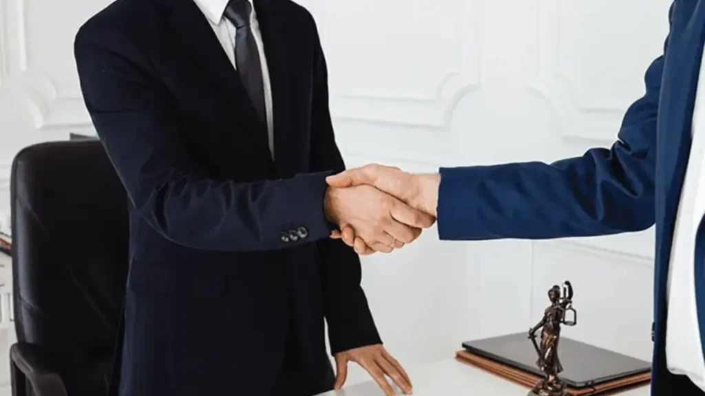 QNET Entrepreneurs shaking hands