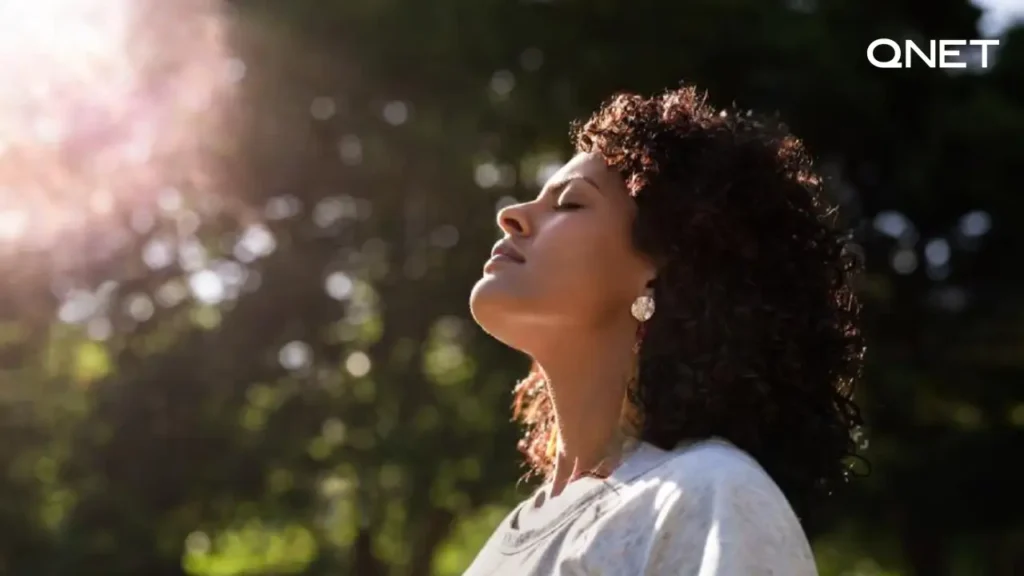 A young Woman with Vitamin D Deficiency standing under the sunglight